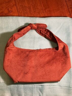 Women’s Knotted Handle Corduroy Shoulder Bag - Rust brown.